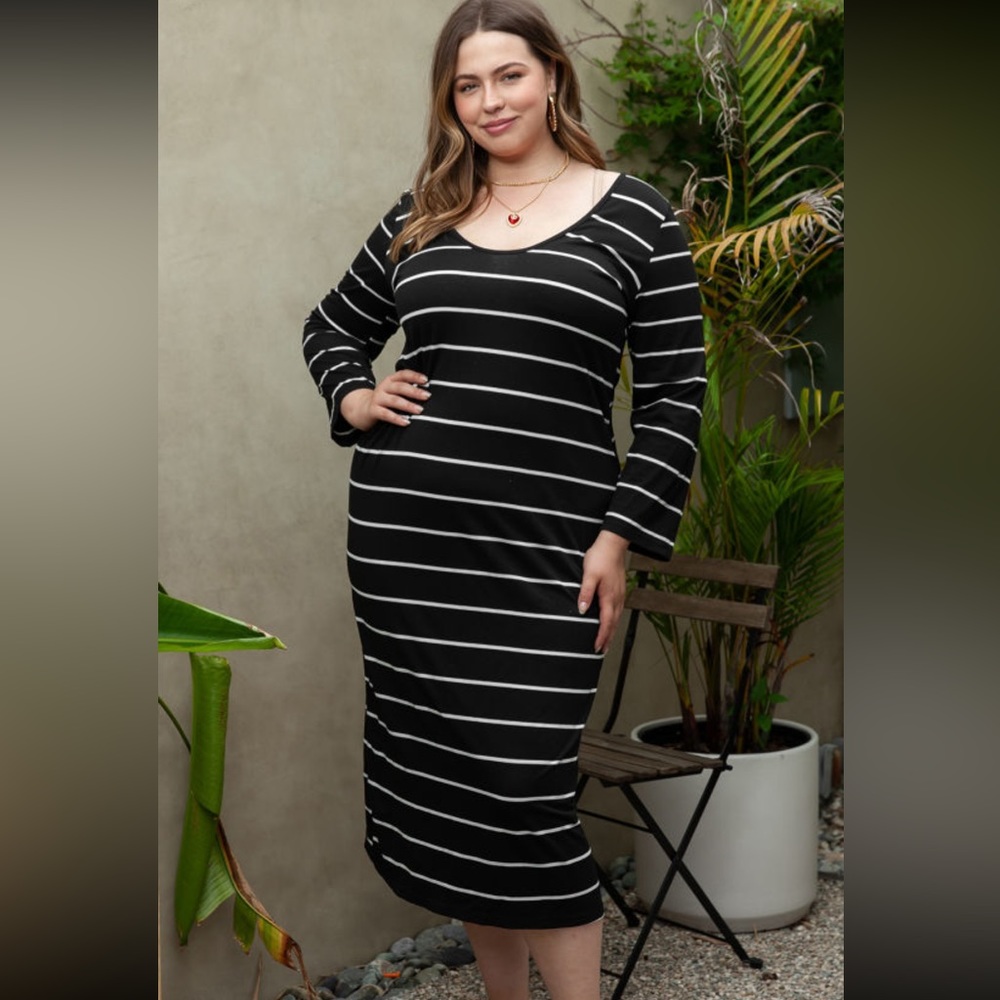 Black long sleeve midi tshirt dress with white stripes and roll up cuff button.